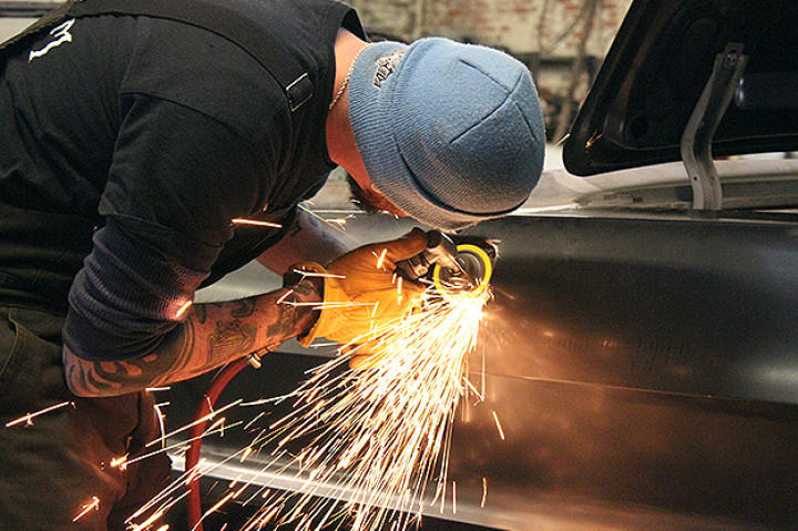 Walter working on the Impala.