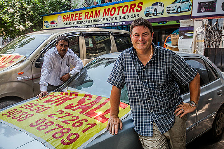Mike Brewer posing with local car expert Chak.