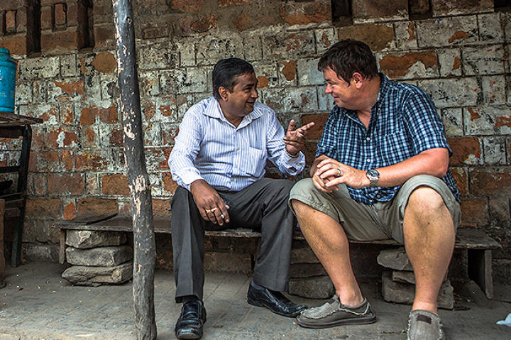 Mike Brewer posing with local car expert Chak.