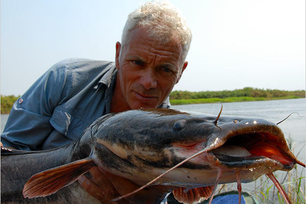 Jeremy Wade holds a blue catfish.