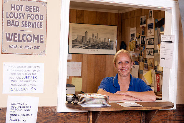 Responsible for handling all inventory, office manager Cindy Shook tags every piece of the 500 lots a week that the auction house takes in. She's also responsible for collecting money from winning bidders.