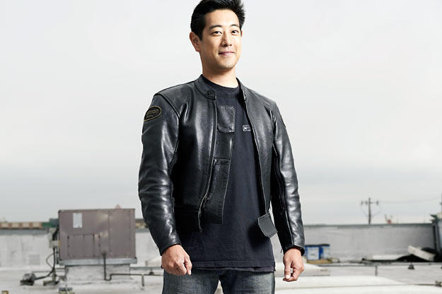 Grant Imahara poses atop M5 for a Discovery Channel photo shoot in August 2007.