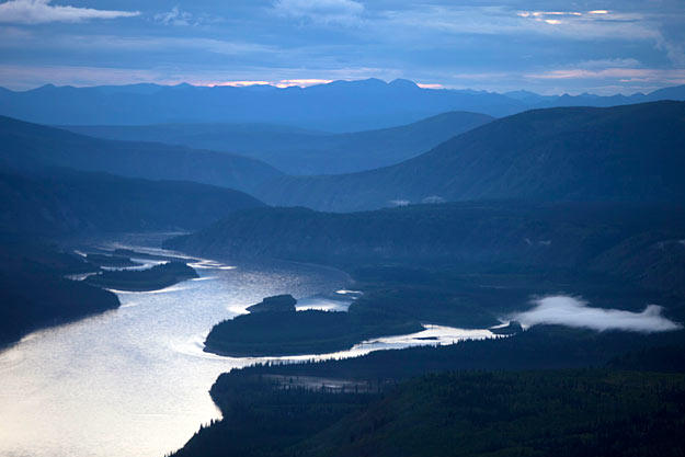 Sunset over the Dawson City valley as seen from a lookout position over the town. Quartz Creek lies about 45 miles south down along the Yukon River Valley.