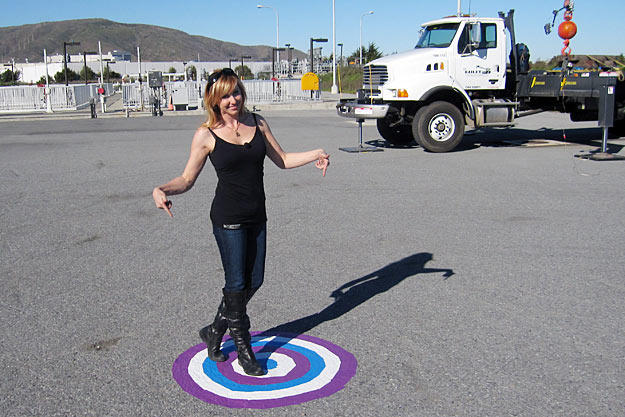Kari Byron shows off the saucy target painted just for Buster in the "Water = Pavement" test.