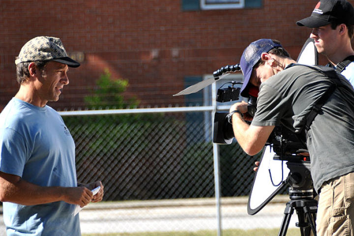 Director of photography Doug Glover and assistant cameraman Ryan Walsh shoot Mike Rowe's introduction to the "Cricket Farmer" episode.