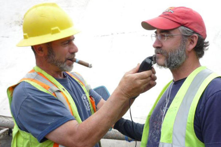 Big-hearted Chris Doumitt shaves producer Ed Gorsuch's beard.