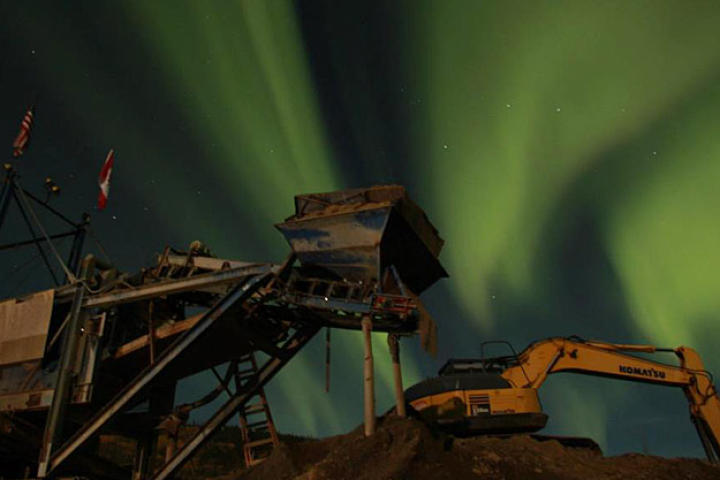 The Northern Lights fill the sky over the Hoffman's wash plant.
