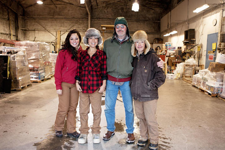 The flying Tweto family — Ayla, Ariel, Jim and Ferno — in one of the cargo hangars at the Unalakleet airport.