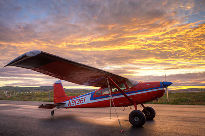 Jim's beloved 1969 Cessna 180 is the only plane he still likes to fly. The 180 is a great bush plane with "tail-dragging" performance that keeps the prop up during off-airport landings.