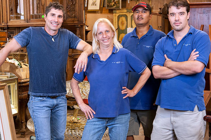 The Gallery 63 crew, from left to right: owner Paul Brown, office manager Cindy Shook, handyman Delfino Ramos and assistant manager/picker Jon Hammond.