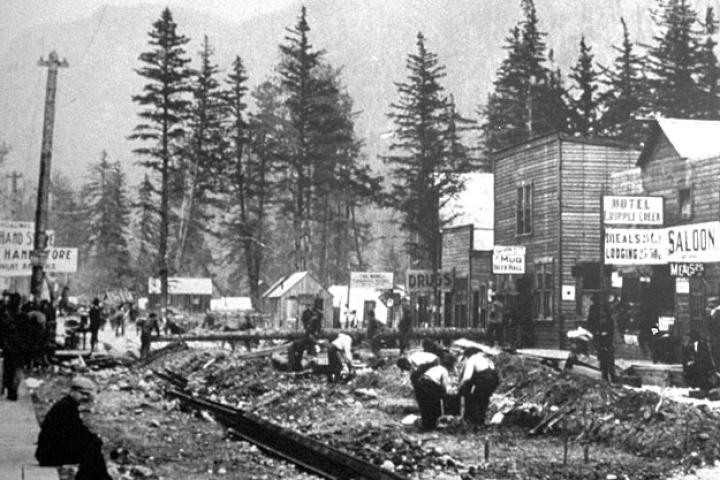 Within weeks after news of the Klondike gold discovery reached Seattle in the summer of 1897, Skagway, Alaska (above) was transformed into a frontier boom town with saloons, cheap hotels, bawdy houses and supply stores. Skagway and nearby Dyea both served as the major jumping off points for the overland routes that led to the gold fields in Canada's Yukon Territory.