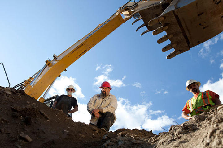 Jack, Todd and Dave Turin around a test pit at Mine 1.