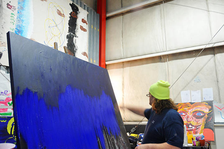 Mikey Teutul paints over a painting he decided he didn't like. We thought it looked cool like this, actually.