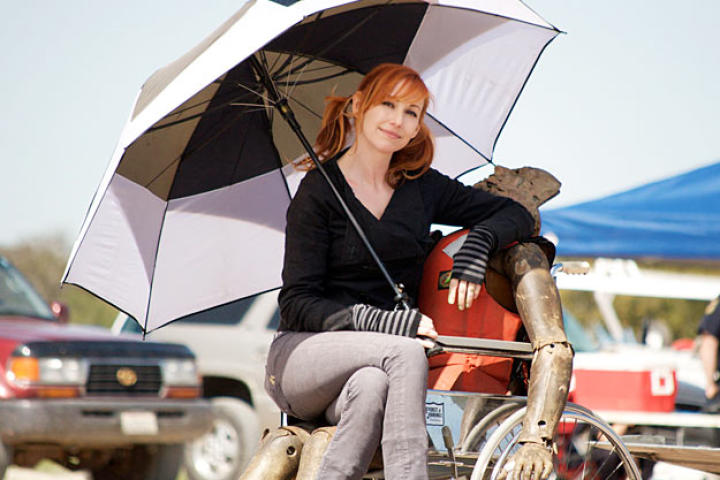 Kari Byron cozies up to Buster during the filming of Fireworks Man in 2010.