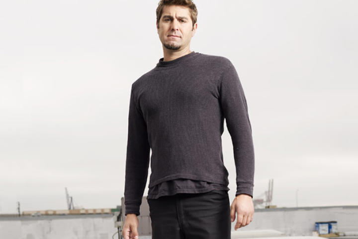 Tory Belleci poses on the roof of M5 for an August 2007 Discovery Channel photo shoot.