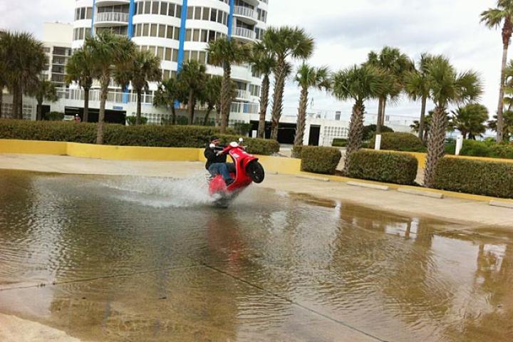 Giving the scoot an undercarriage wash! (March 10, 2011)
From Vinnie's Facebook feed.