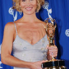 With her 2002 Emmy Award for Outstanding Guest Actress In A Comedy Series.