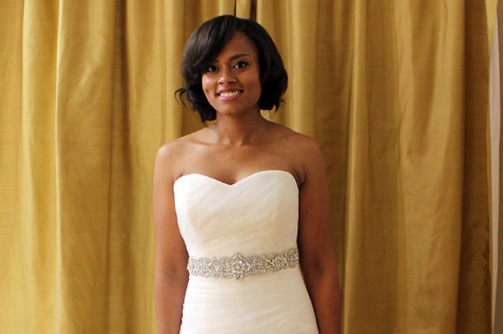 For Katie's Valentine's Day-themed wedding, she was determined to wear something romantic and curve-hugging to show off her hard-earned body. Maggie Sottero's 'Primrose,' priced at $1,000, was the perfect choice with its sweetheart ruched bodice and ruffled organza skirt with rosettes. Once Sam added a belt to show off her waist, Katie was sold on the