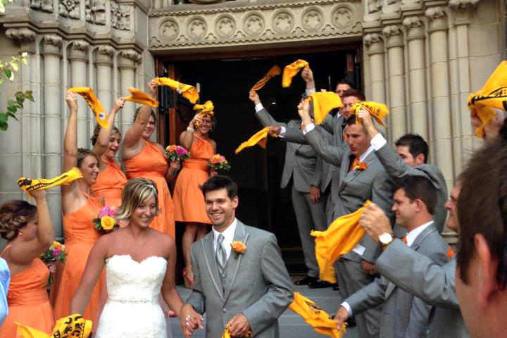 After the ceremony, the guests stood outside the church waving "terrible towels,” a Pittsburgh Steelers staple, for the bride and groom.