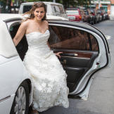 Andrea arrived via a white limousine for her wedding day!