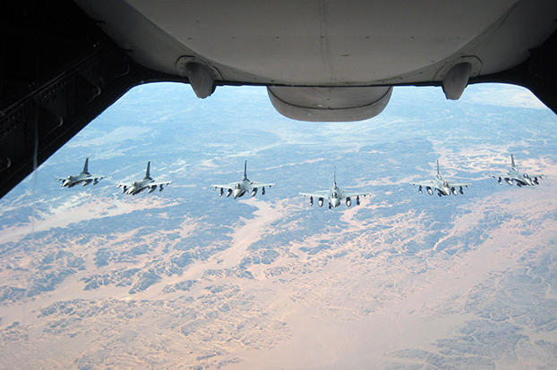 Six F-16 Fighting Falcons wait their turn to be administered fuel from a KC-10 over Afghanistan during Operation Enduring Freedom. In 2009, KC-10s from the 380th AEW and the 908th EARS flew 4,760 combat sorties offl-loading 422,222,300 pounds of fuel.