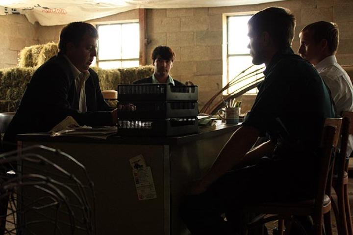 Lebanon Levi (left) is the Amish insider who holds the power and serves as protector of the community for a price. He exists above the law and occupies the role of police, judge and jury.