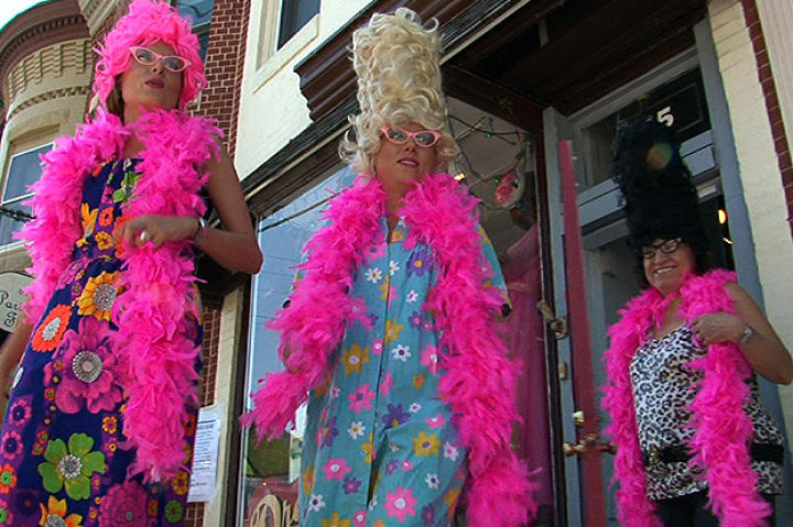 The Hons sport beehives, boas, bright colors and bold patterns so they can blend into Baltimore's hottest festival.
