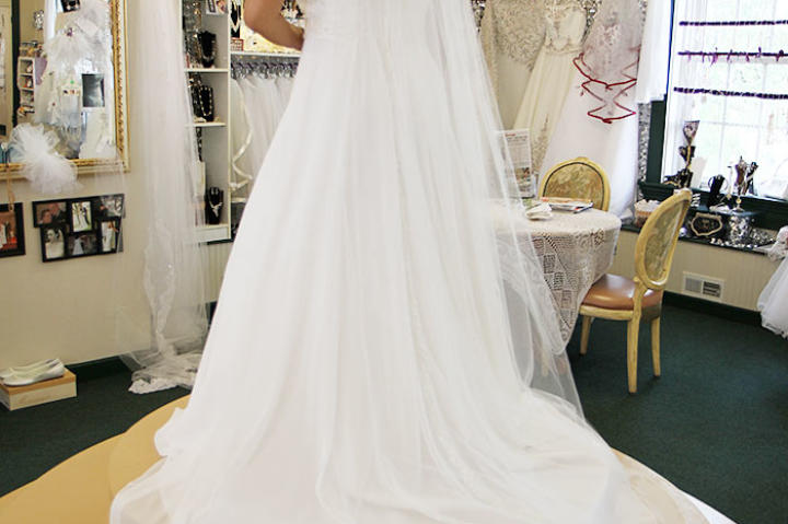 Aya enjoys a final moment in this gown and veil; she and Louis get frank about his financials, and it looks like this gown is out of the question. Their wedding planning takes a sad turn, and Aya is crushed that she won't be getting that dress.