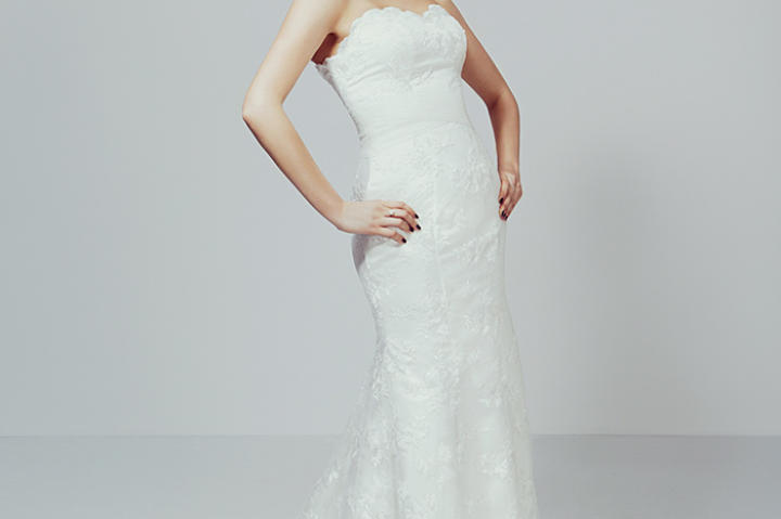 This body-conscious silhouette is a straight line from chest to hem. A