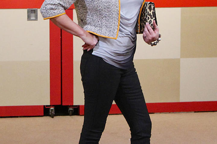 Tweed Jacket with Orange Trim and Black Jeans from