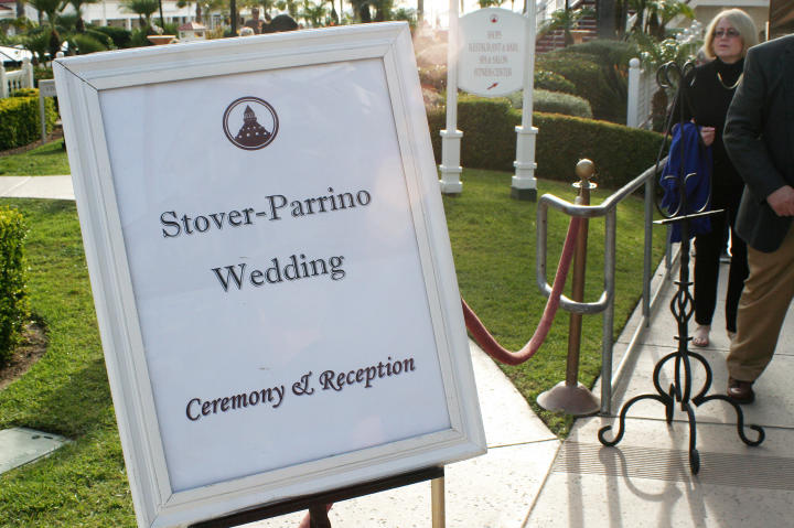 A sign welcomes guests as they arrive for the formal event.