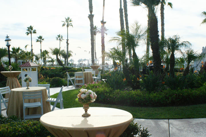 Tables are arranged outside for cocktail hour.