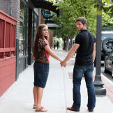 Now that they're engaged, they can finally hold hands! Get the lowdown on