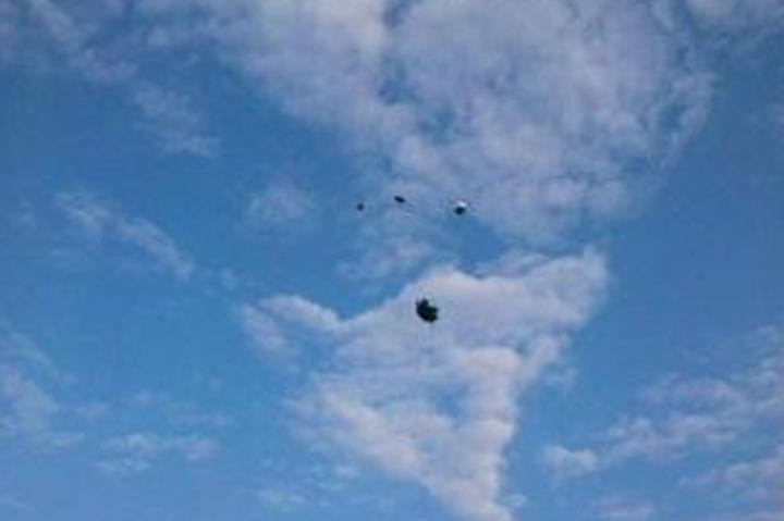 Our friends lost their baby grandson to a SIDS-like incident. On what would have been his birthday his mother and grandparents went to the cemetery to release balloons in his honor. They snapped this photo. We see broken heart clouds and a baby face with angel wings.
-Beth
