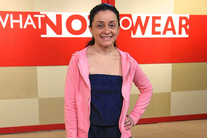 Single mom and business owner, Tania, frequently wears a frog costume to promote her burgeoning catering company.