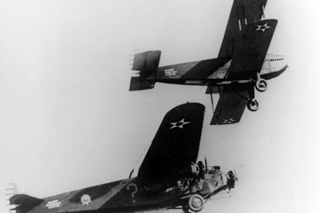 A closer view of the Fokker getting refueled by the Douglas C-1.