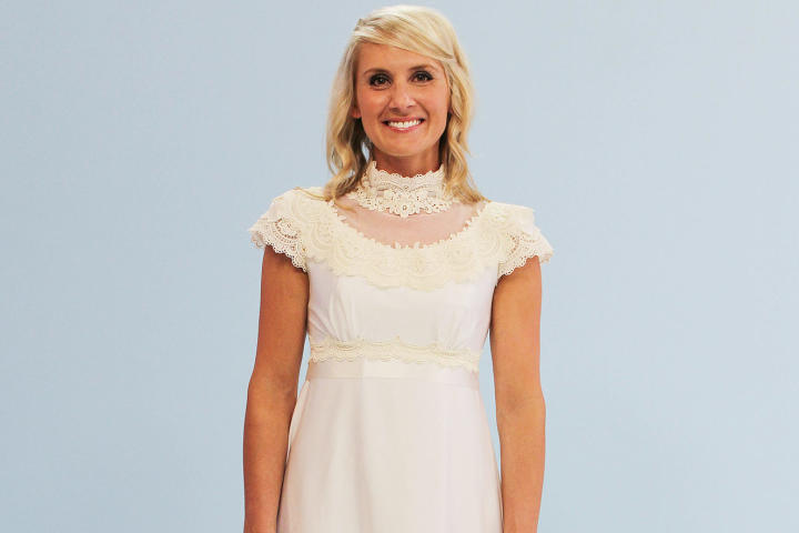 Marcy's other dress choice was this lace and chiffon A-line from her mother's closet. While her mother was proud that the gown once graced the cover of a bridal magazine, Marcy was unimpressed with the satin belt, high neckline and cap sleeves.