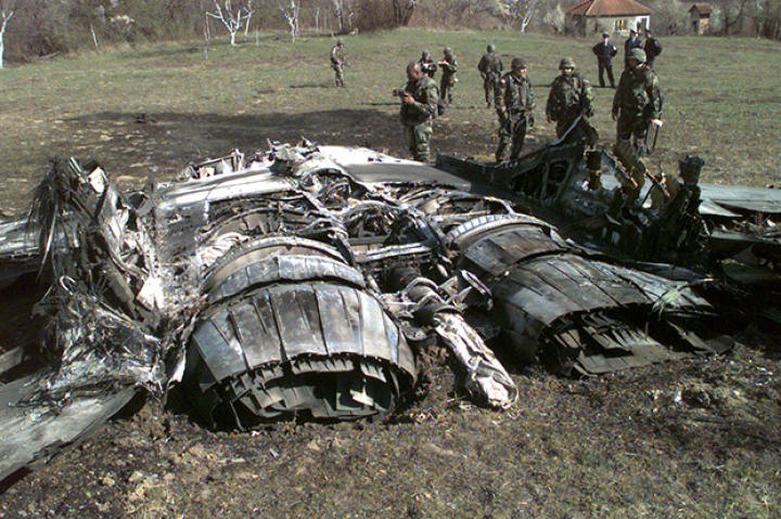 One MIG mess. A U.S. Army documentation team surveys the wreckage of a Former Republic of Yugoslavia MiG-29 Fulcrum jet fighter shot down by NATO forces in Bosnia and Herzegovina, March 27, 1999.