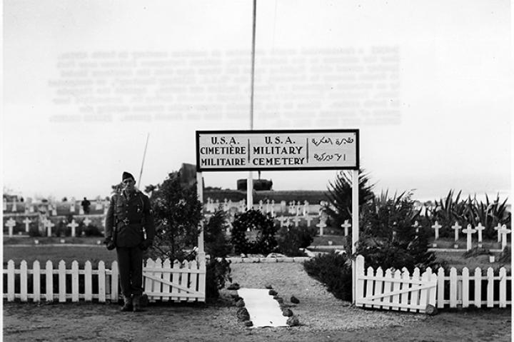 Original caption: "A Presidential wreath decorates an American cemetery in North Africa." January 21, 1943
