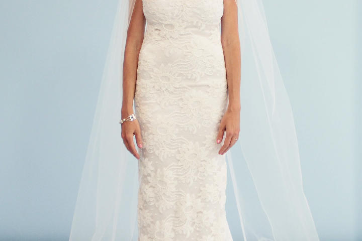 Amy was floored by the transformation of her borrowed dress. The sexy fit and super low illusion back were edgy, yet formal. She also loved the low V-neck and sparkling crystal overlay. All these updates cost only $1,000. She promised to wear this gown on her wedding day.