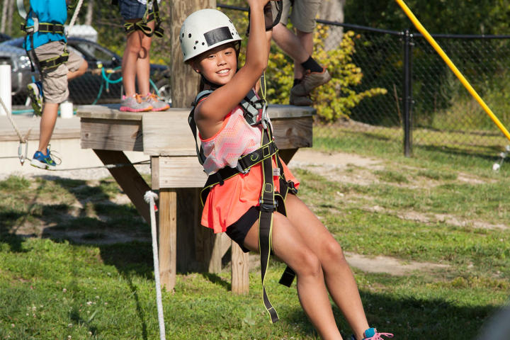 Hannah tries her hand on the ropes course.