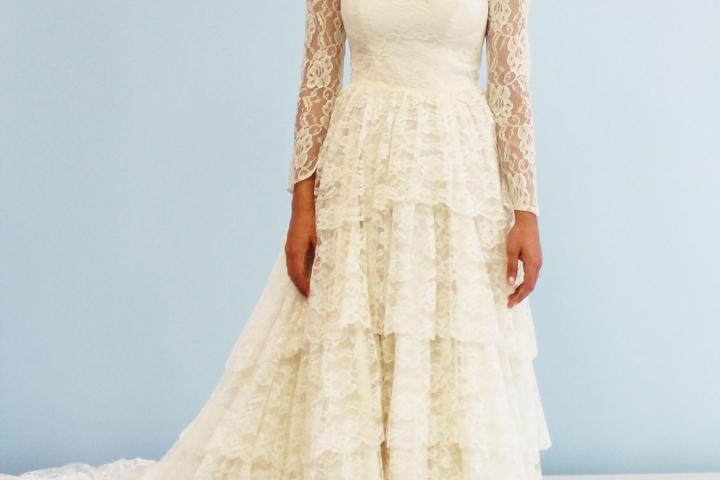 Rameneh's father purchased this dress in the United States in the 1970s and took it to Iran for his bride to wear. The delicate lace sleeves and layers of embellished lace resonated with '70s glam, and Rameneh craved something more modern.