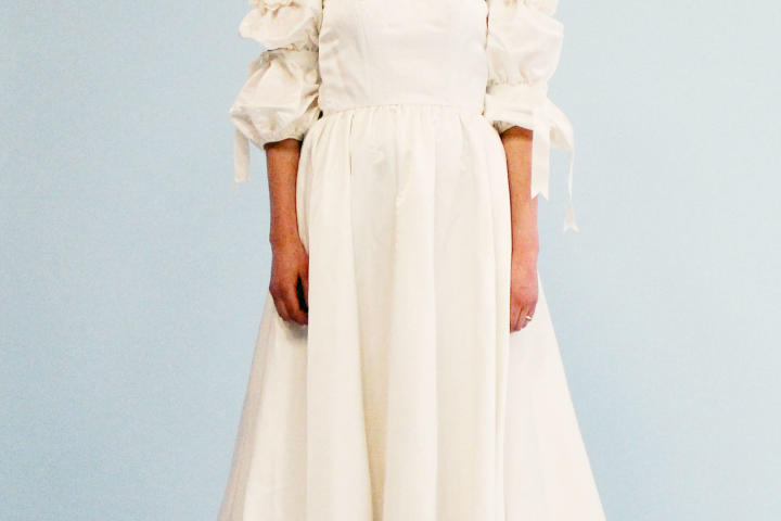 In its before state, Sally wasn't too thrilled about her mother's dress. The Princess Diana-inspired 1980s satin ball gown had off-the-shoulder sleeves with bold bow details.