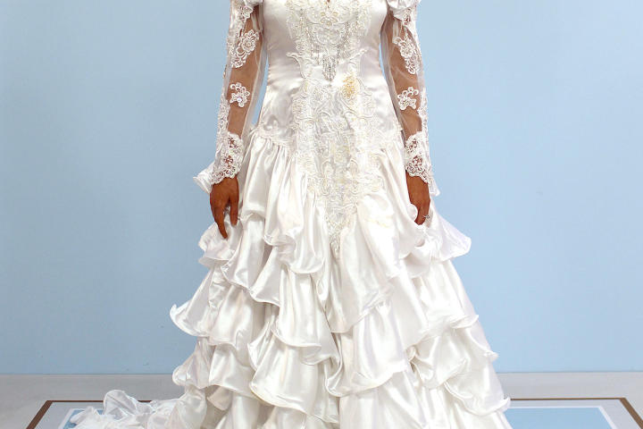 Alexis' mother had been saving her dress for more than 20 years and had moved it to six different houses! She was determined that Alexis would love the