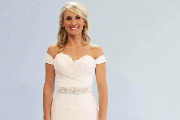 Indianapolis bride Marcy was planning a big Catholic wedding and didn't want to wear anything too sexy. She found a perfect balance between conservative and body conscious in