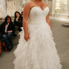 Helena kept it classic with a sweetheart neckline, but had a little fun with a flirty skirt.