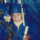 Jen graduating from kindergarten.