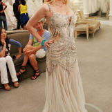 It was beads or bust for Autumn, who chose two pricey dresses for her ceremony and reception.