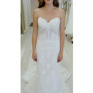 White can be the color of innocence, but this boned corset gown offers a hint of sex appeal, too.