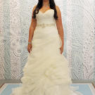 Cloud-like layers of organza add volume to a basic A-line silhouette.